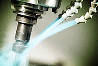 Metalworking fluid additive